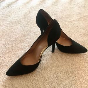 Black heels with gold accents